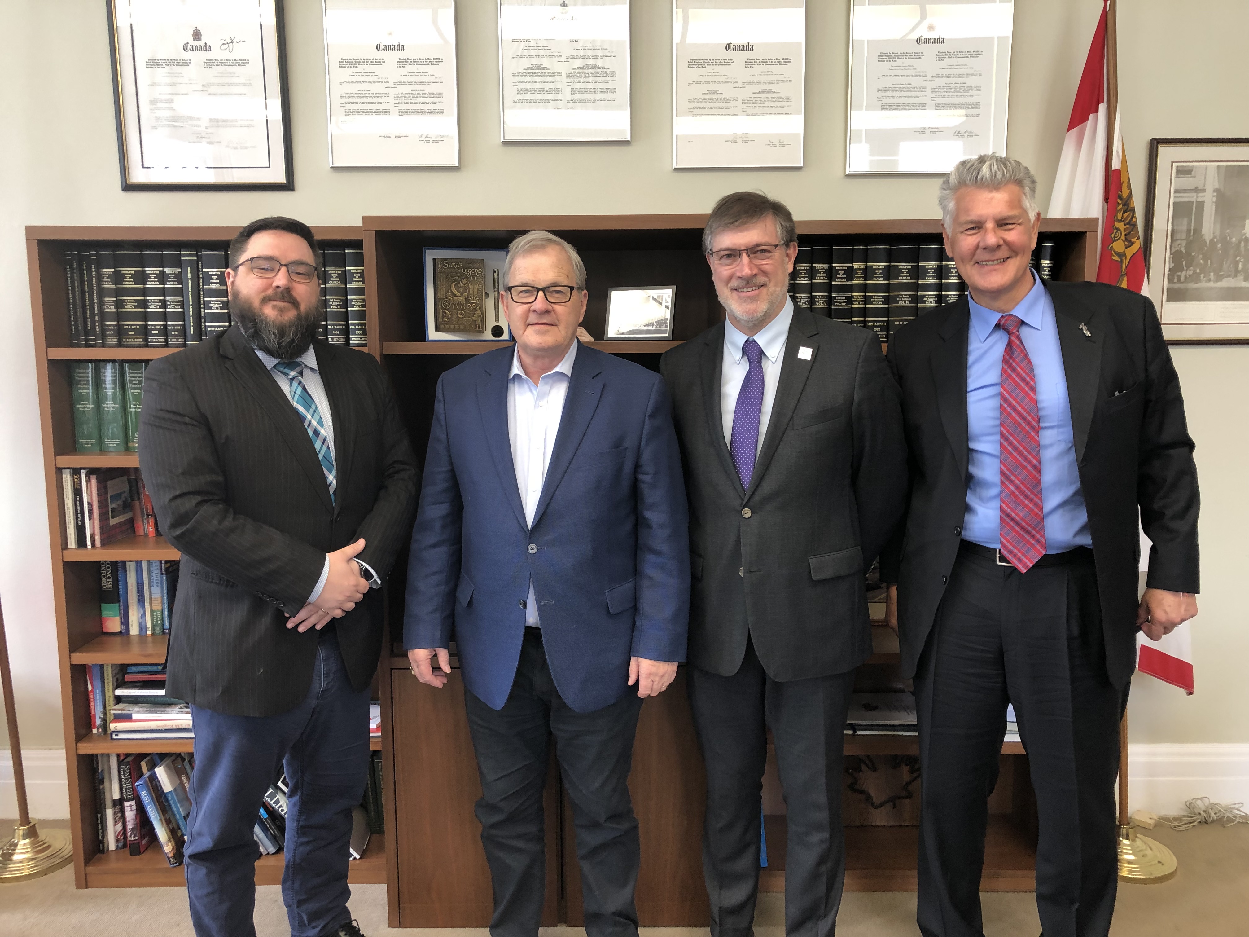 From left, Federal Retirees advocacy and policy officer Patrick Imbeau, Minister of Veterans Affairs Lawrence MacAulay, Federal Retirees CEO Simon Coakeley and Federal Retirees director of communications, marketing and recruitment Andrew McGillivary.