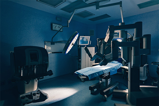Surgical room in hospital with robotic technology equipment.