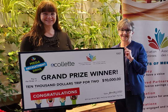 Brenda Powell (left), president of Charlottetown Branch, is pictured here presenting the grand prize to a very lucky member of her branch, Anna Anderson. Brenda Powell (left), president of Charlottetown Branch, is pictured here presenting the grand prize to a very lucky member of her branch, Anna Anderson.