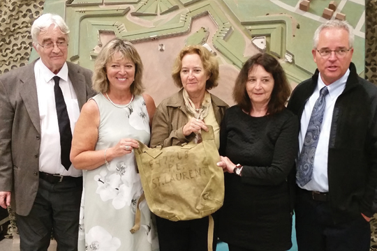 Lise Saint-Laurent Fleury, second from the left, holding the backpack surrounded by her siblings. Lise Saint-Laurent Fleury, second from the left, holding the backpack surrounded by her siblings.
