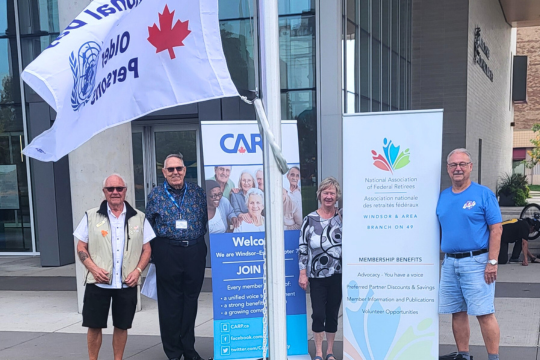 Windsor & Area Branch volunteers join volunteers from CARP and UNIFOR for a flag-raising ceremony on National Seniors Day 2023.