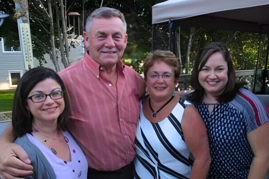 Brian Hills is pictured here with his wife, Sam, and their daughters, Paula Graham and Lisa Harvey.