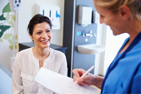 A doctor with an adult patient. 