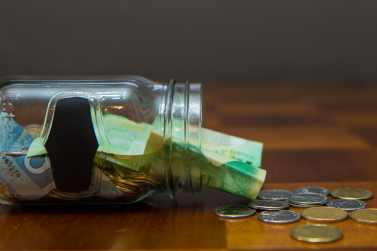 Tip creep continues. A jar with tip money.