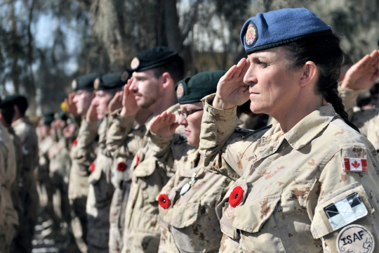 Invisible no more Soldiers from the 1st Battalion, The Royal Canadian Regiment Battle Group, during a Remembrance Day ceremony.