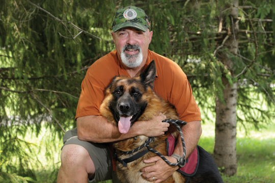 Richard Moreau and his dog, Timo.