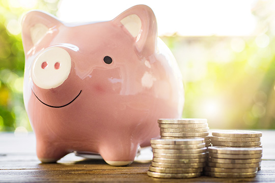 Piggy bank with coins. Piggy bank with coins.