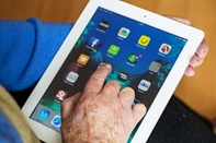 Senior using an iPad