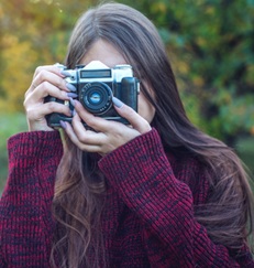 Girl with camera.