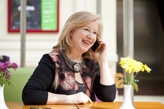 Woman speaking on a phone