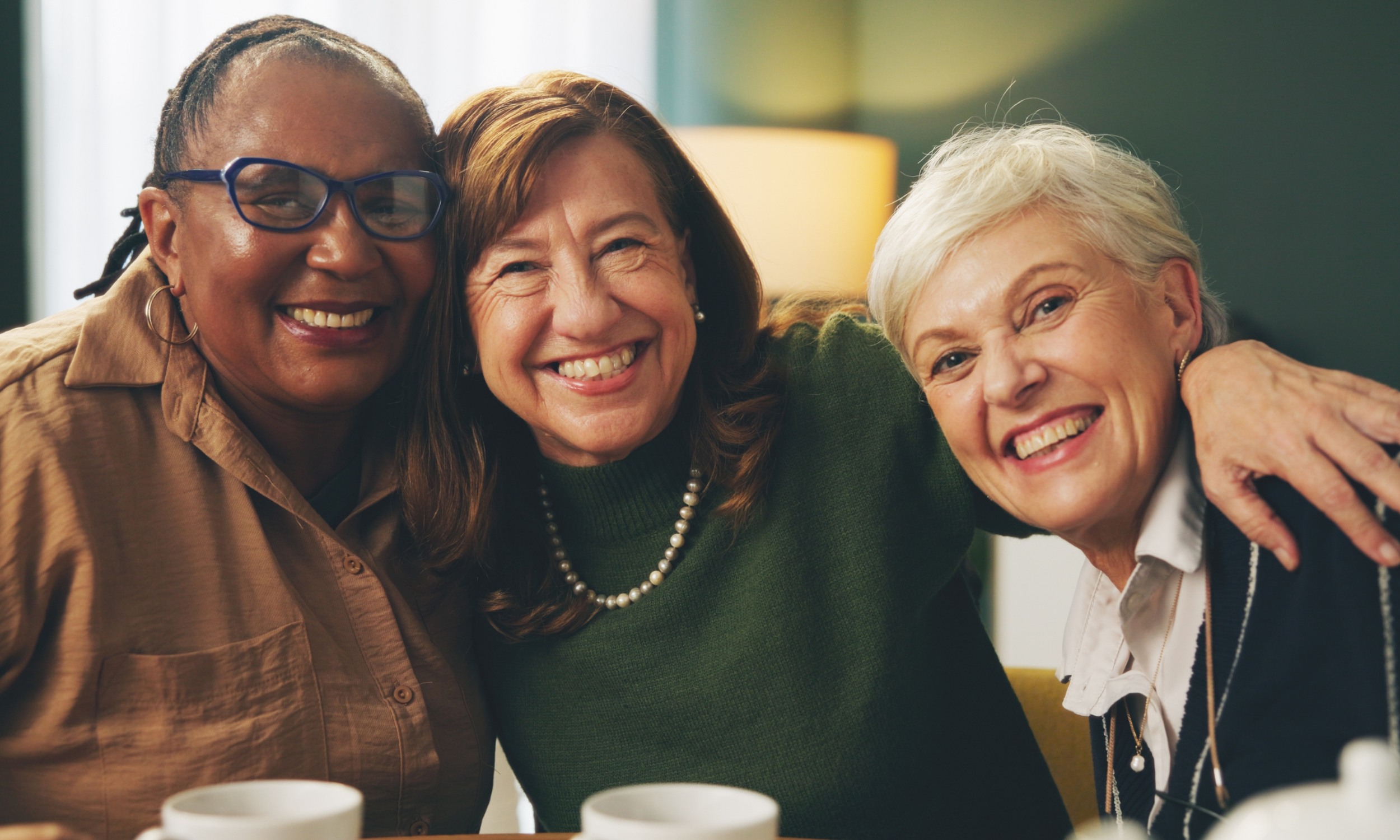 Group of smiling women.